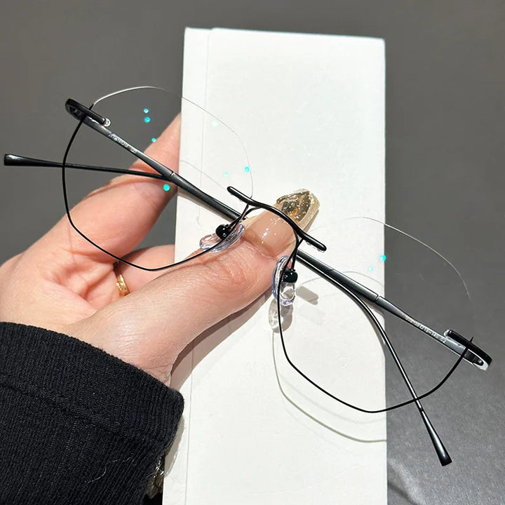 Zirosat Women's Rimless Oval Polygon Titanium Eyeglasses 63249