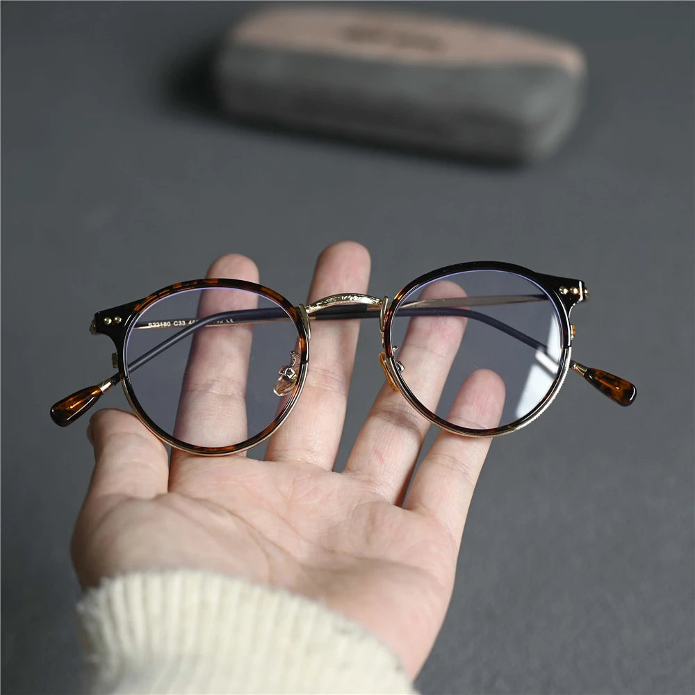 Cubojue Women's Full Rim Round Tr 90 Alloy Eyeglasses 522180