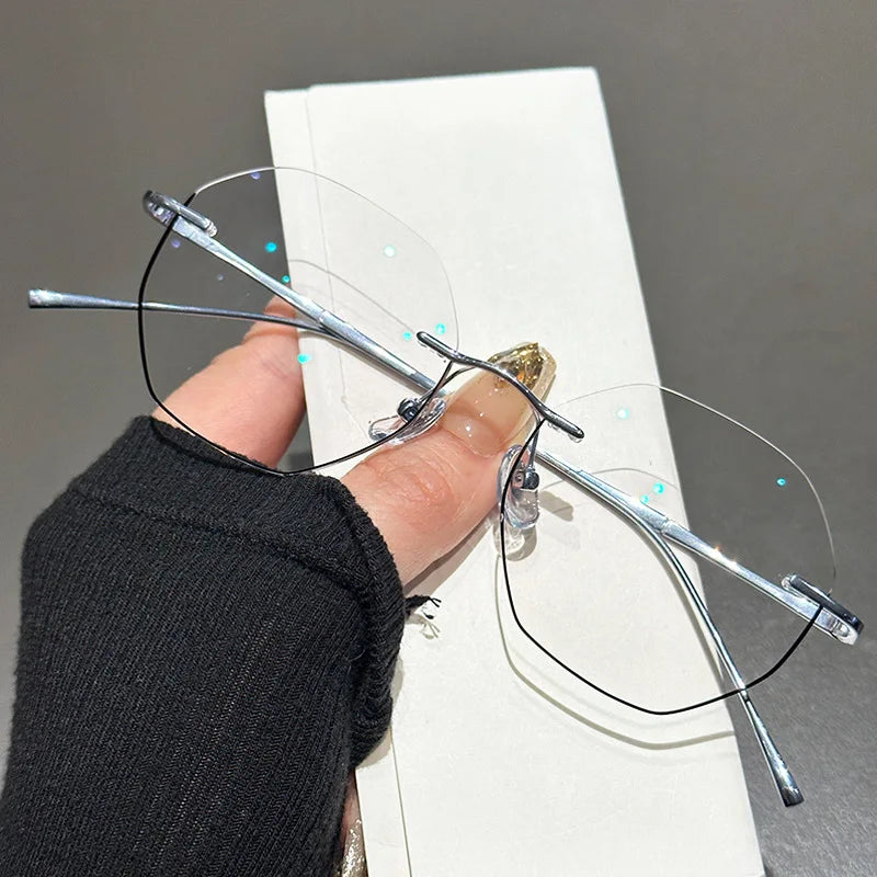 Zirosat Women's Rimless Oval Polygon Titanium Eyeglasses 63249