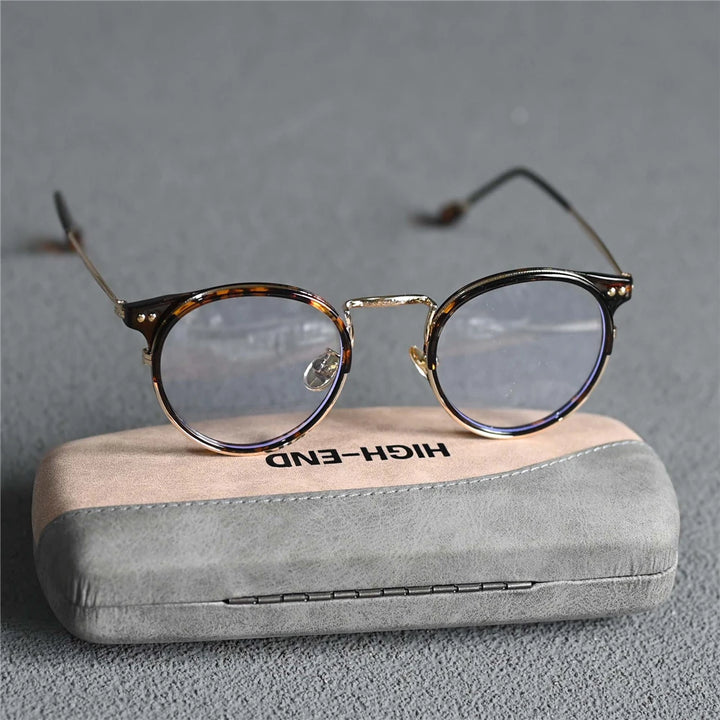 Cubojue Women's Full Rim Round Tr 90 Alloy Eyeglasses 522180