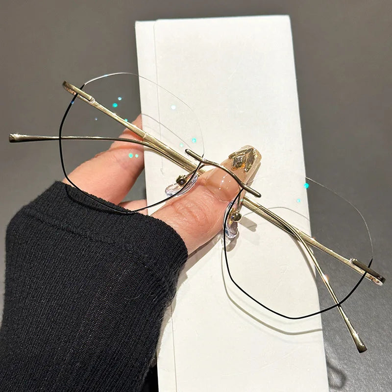 Zirosat Women's Rimless Oval Polygon Titanium Eyeglasses 63249