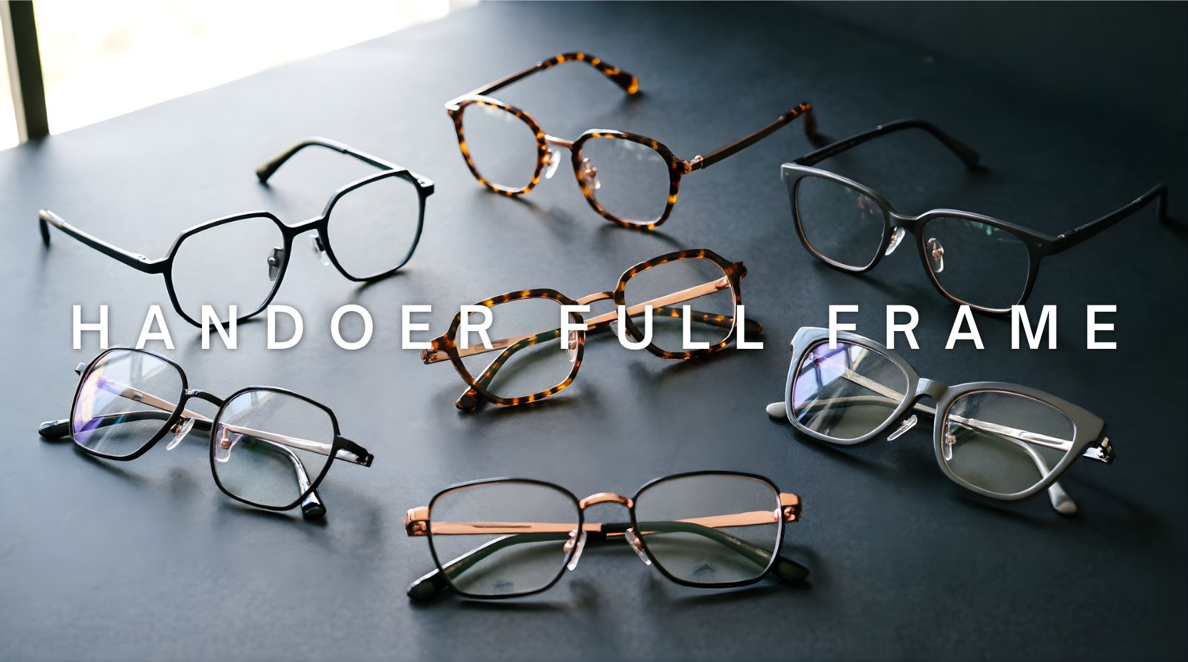 FuzWeb Handoer full frame collection featuring polygon oval square and cat-eye eyeglasses in titanium and TR90 on deep charcoal studio background with natural lighting
