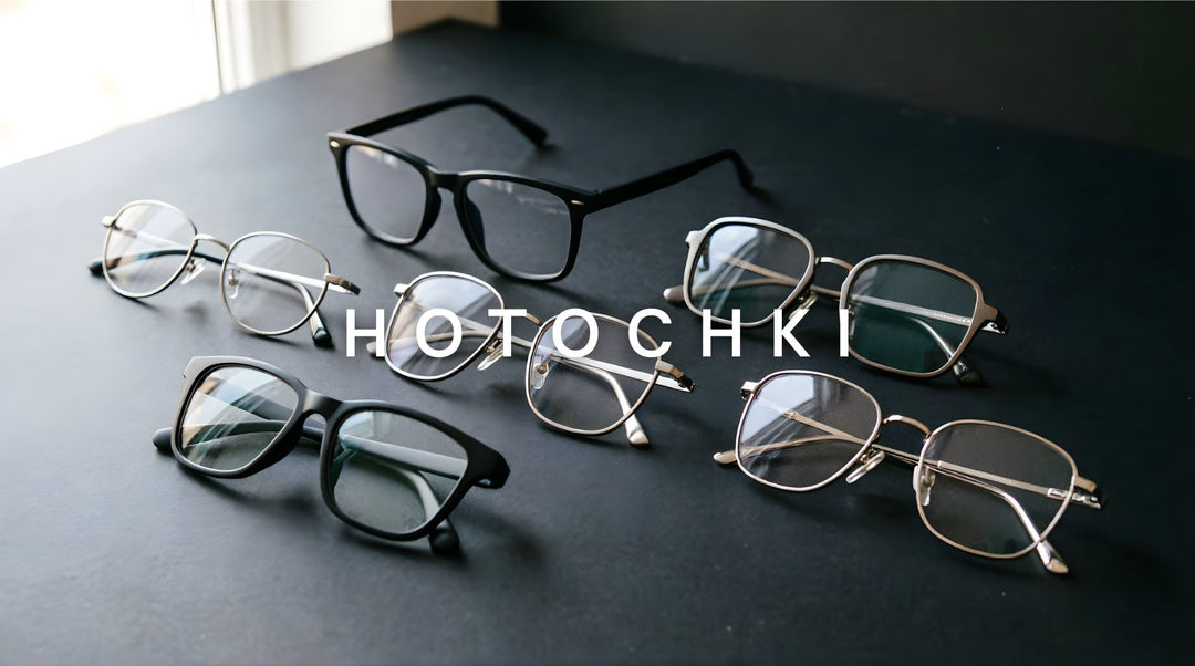 FuzWeb Hotochki eyeglasses collection featuring TR90 titanium stainless steel and aluminum magnesium frames in full-rim semi-rim oval square and irregular styles on deep charcoal studio background with natural lighting