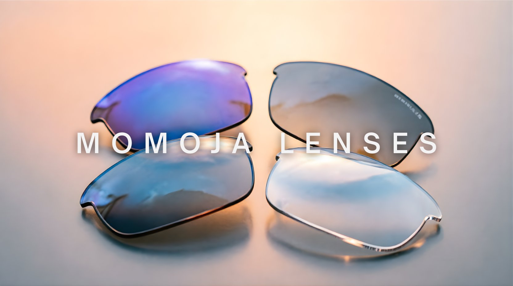 FuzWeb Momoja lenses collection featuring anti-blue light progressive photochromic and polarized lenses on light peach-gray studio background with soft front-right lighting