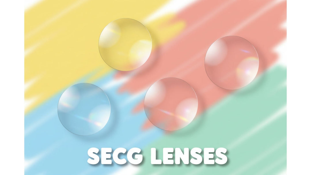 Four clear uncut round Secg CR-39 optical lens blanks arranged playfully on a colorful background, representing the Secg children's single vision lens collection available at FuzWeb
