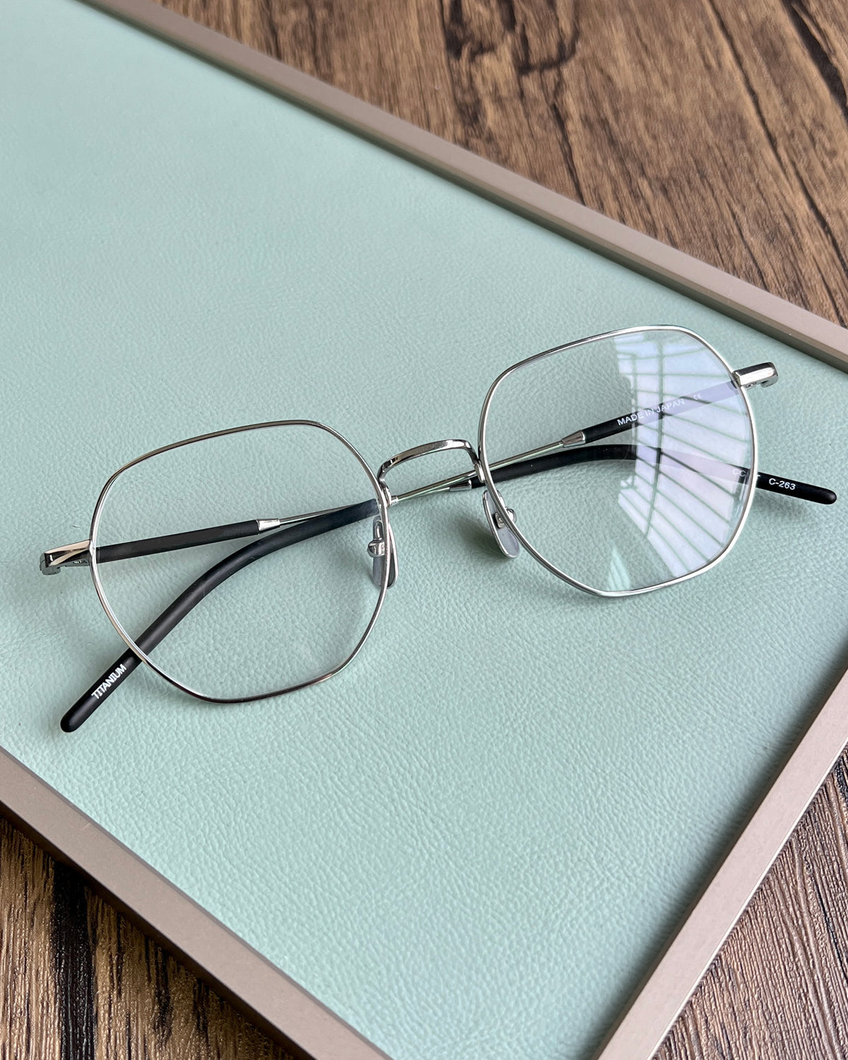 Aimee Unisex Full Rim Flat Top Polygon Oval Titanium Eyeglasses 236649 — view 1 | Aimee at FuzWeb