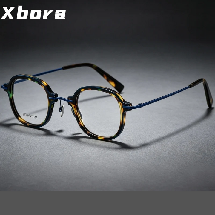Xbora Unisex Full Rim Round Titanium &amp; Acetate Eyeglasses 98512 — view 1 | Xbora at FuzWeb