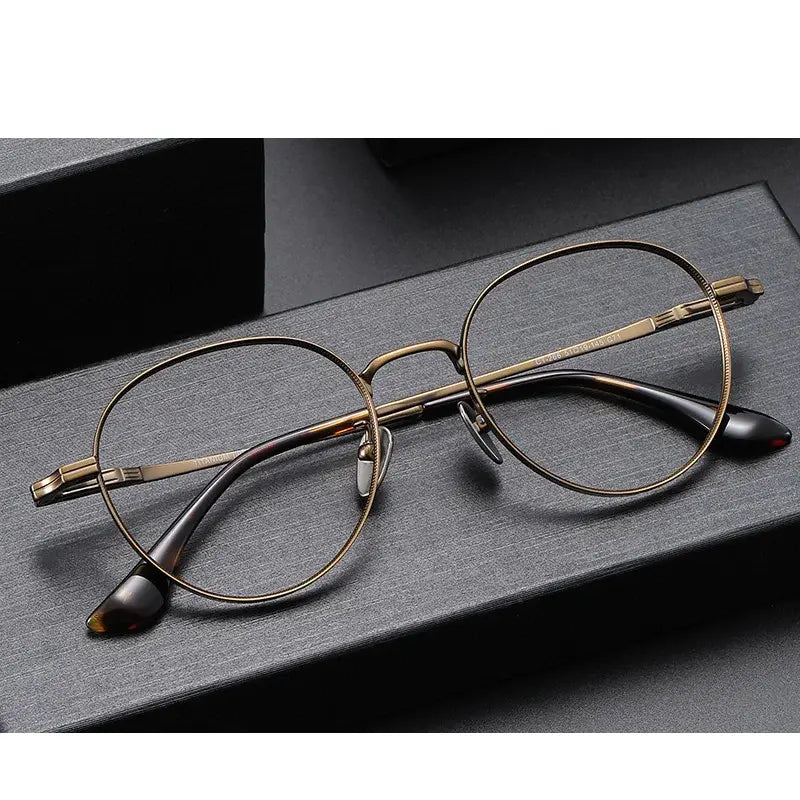 Kansept Unisex Full Rim Round Titanium Frames 266000 FuzWeb