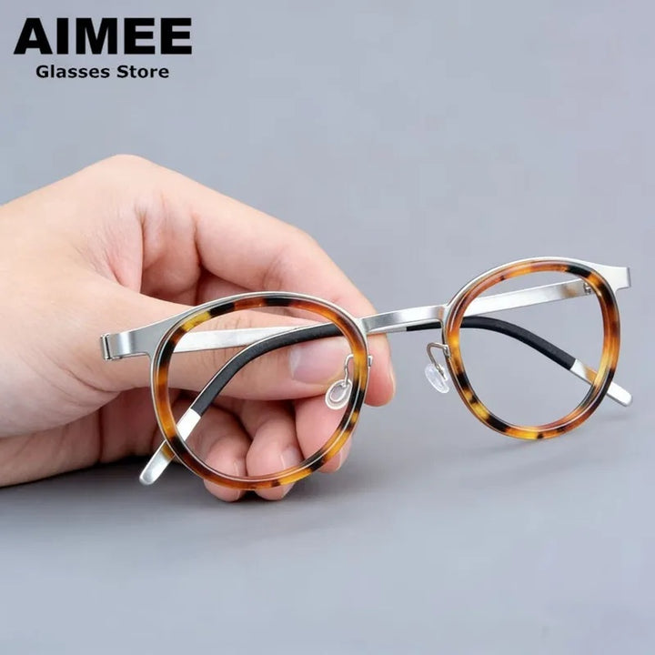 Aimee Womens Full Rim Oval Round Acetate Titanium Eyeglasses 489799 — view 1 | Aimee at FuzWeb