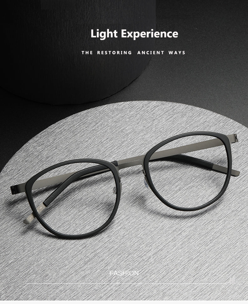 Oveliness Unisex Full Rim Round Screwless Titanium Eyeglasses 9737 — view 1 | Oveliness at FuzWeb