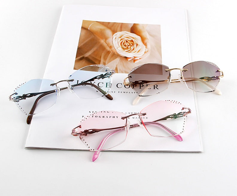 Chashma Womens Rimless Round Titanium Eyeglasses 8036c — view 1 | Chashma at FuzWeb