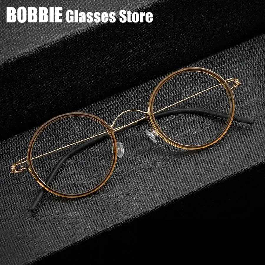 Bobbie Mens Full Rim Round Titanium Eyeglasses 504522 — view 1 | Bobbie at FuzWeb