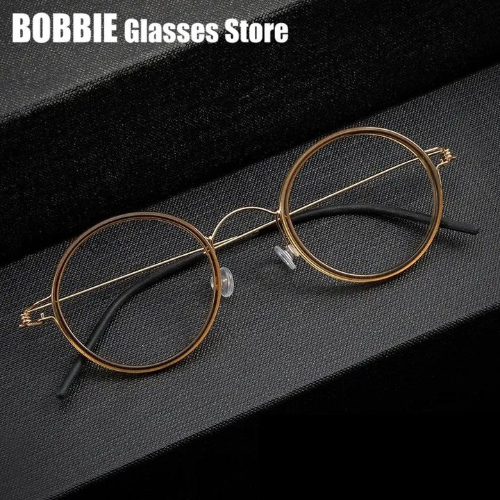 Bobbie Mens Full Rim Round Titanium Eyeglasses 504522 — view 1 | Bobbie at FuzWeb