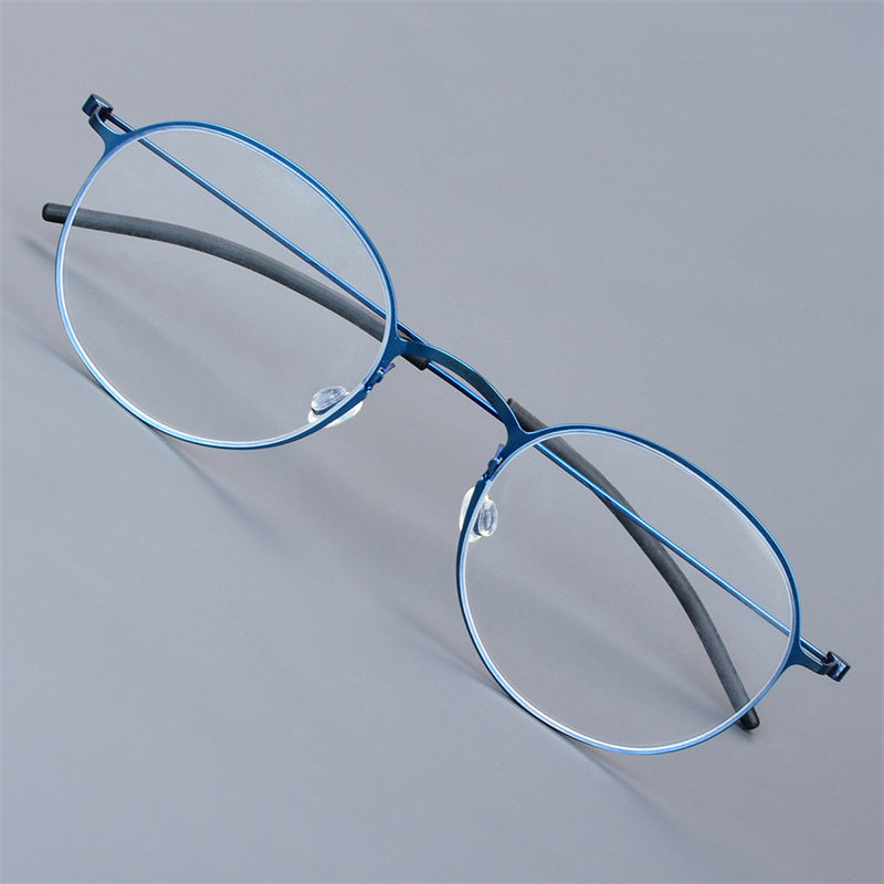 Aimee Womens Full Rim Oval Round Screwless Titanium Eyeglasses 75504 — view 1 | Aimee at FuzWeb