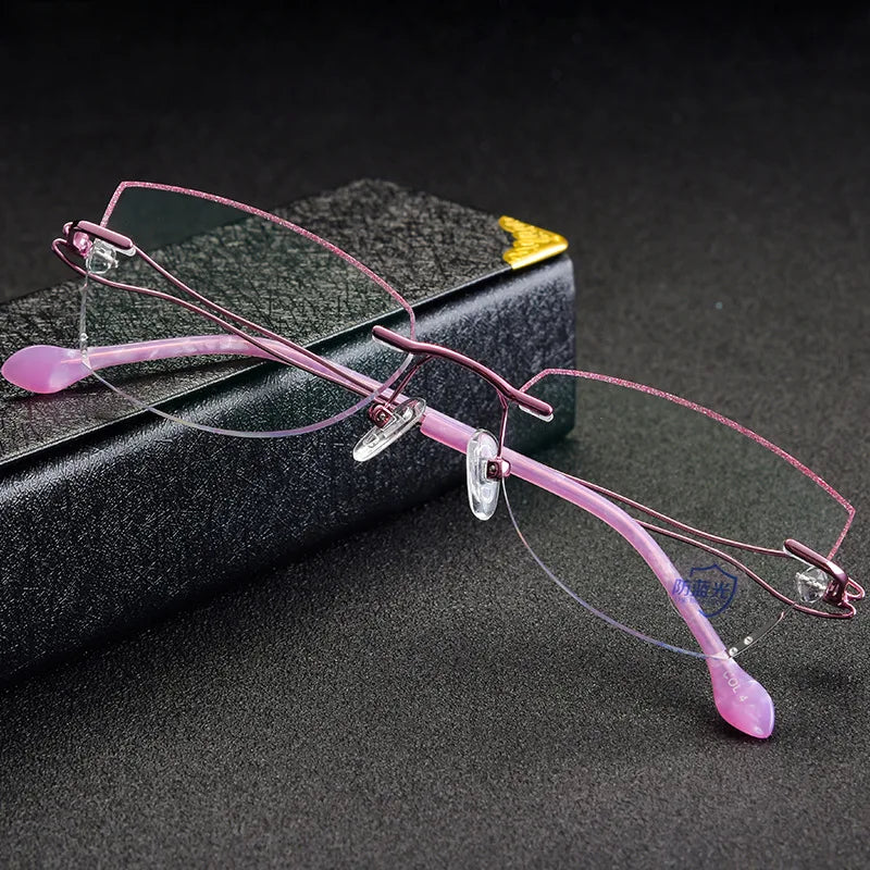 Reven Jate 2534 Women's Round Rimless Eyeglasses