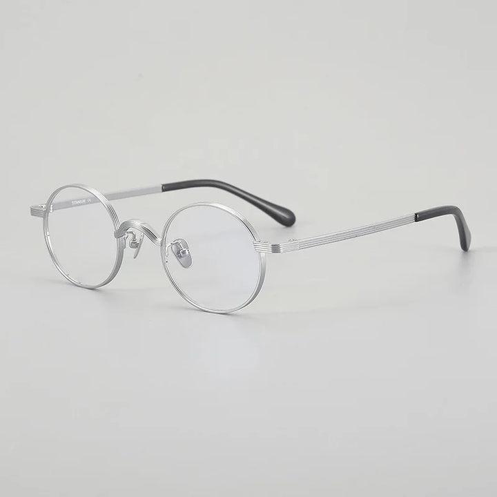 Muzz 116 unisex small round titanium prescription eyeglasses — view 6