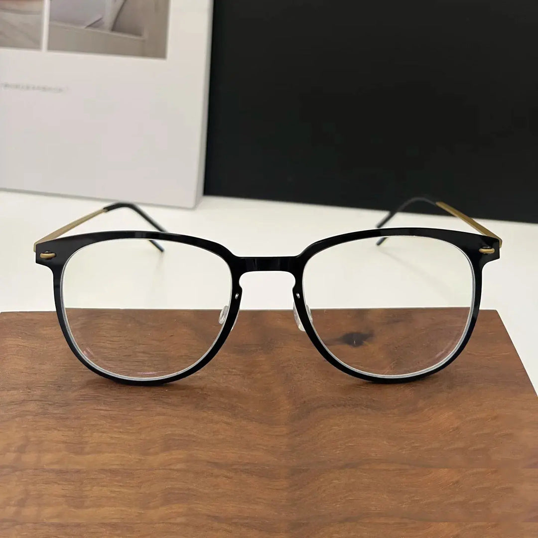 Bobbie Womens Full Rim Round Titanium Eyeglasses 654900 — view 1 | Bobbie at FuzWeb