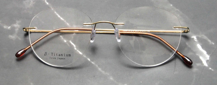 Esnbie Women's Rimless Small Oval Round Titanium Eyeglasses 243213