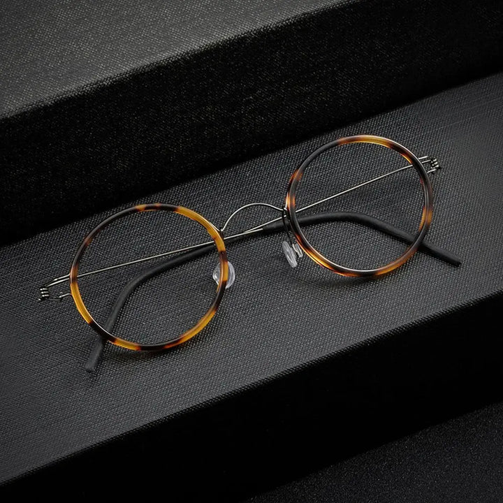 Bobbie 504522 Women’s Titanium Full-Rim Round Frames FuzWeb