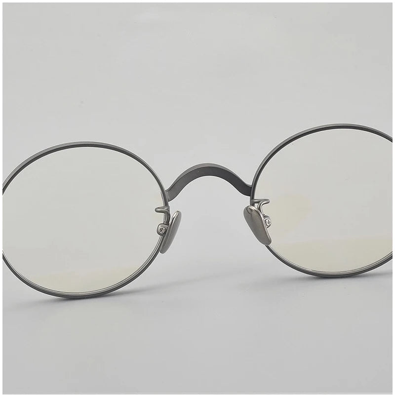 Muzz 116 unisex small round titanium prescription eyeglasses — view 9