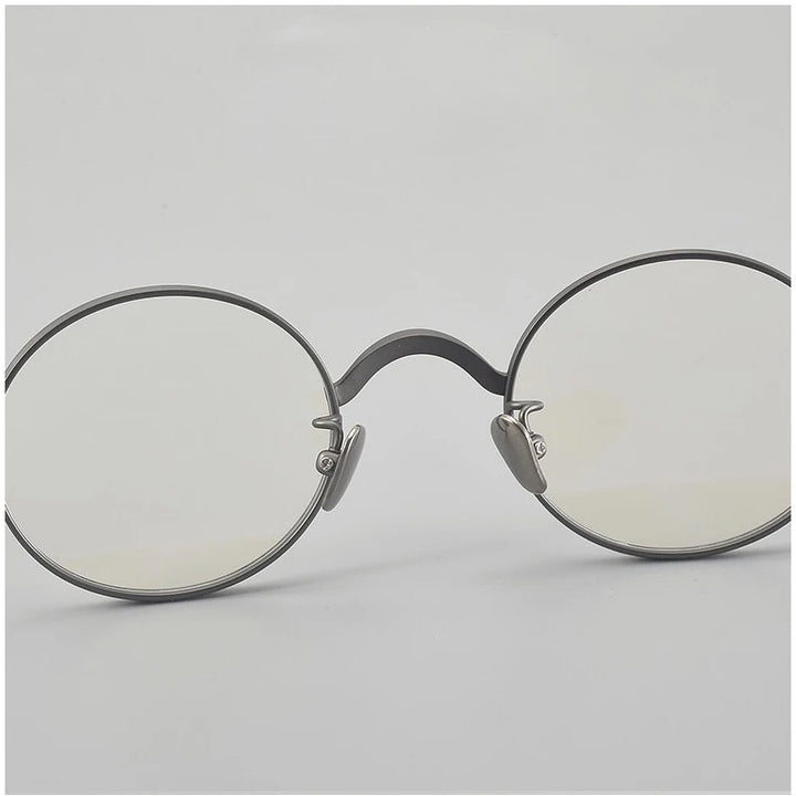 Muzz 116 unisex small round titanium prescription eyeglasses — view 9