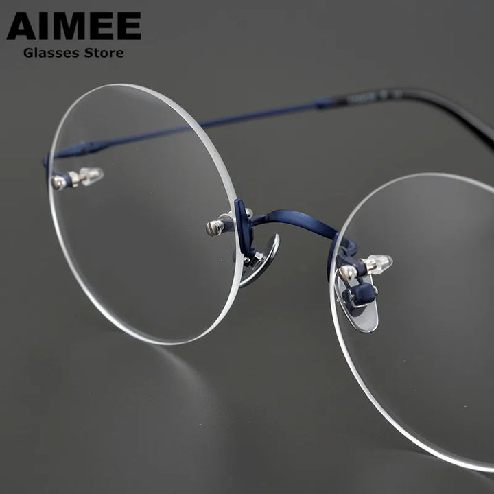 Aimee Unisex Rimless Round Titanium Acetate Eyeglasses 4521