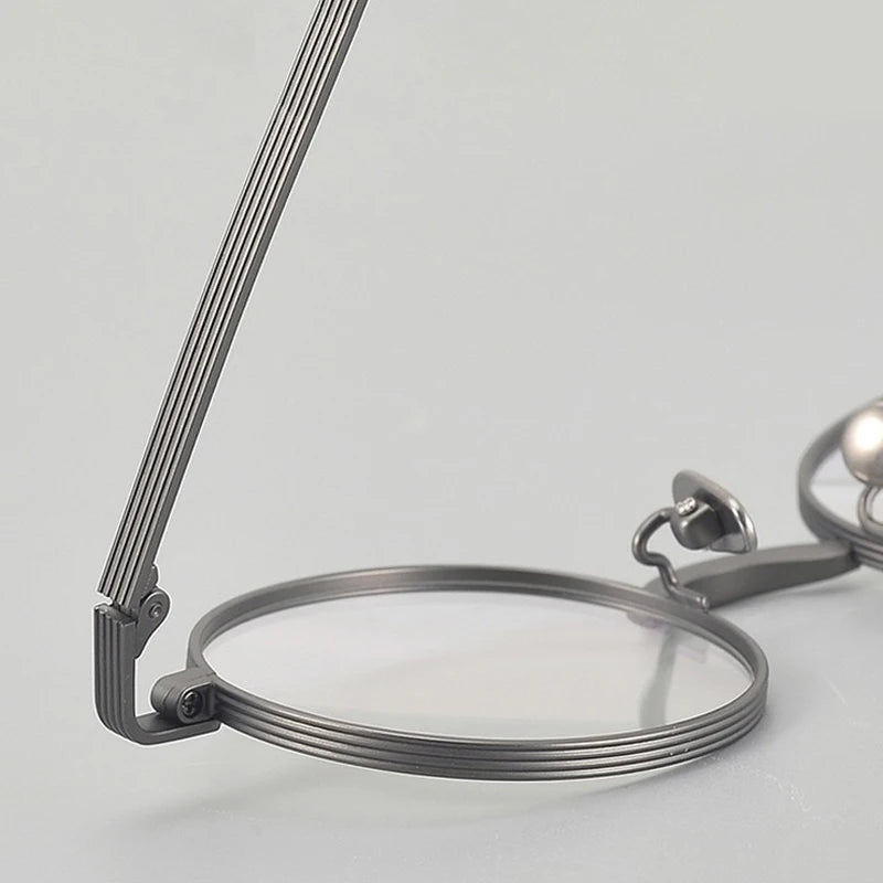 Muzz 116 unisex small round titanium prescription eyeglasses — view 8
