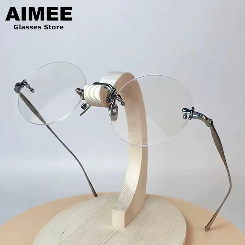 Aimee Unisex Rimless Round Titanium Eyeglasses 361439