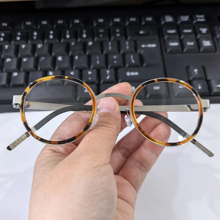 Bobbie Unisex Full Rim Round Titanium Eyeglasses 1011