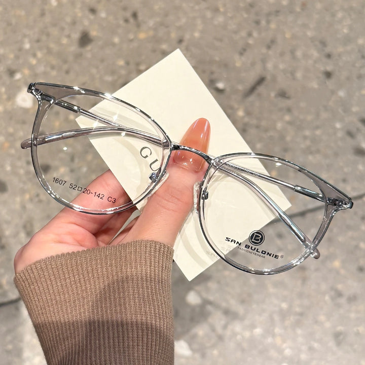 Yimaruili Women's Full Rim Round Cat Eye Tr 90 Alloy Eyeglasses 361607