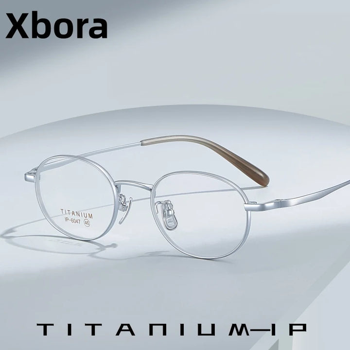 Xbora Unisex Full Rim Oval Pure Titanium Eyeglasses 6047 — view 1 | Xbora at FuzWeb