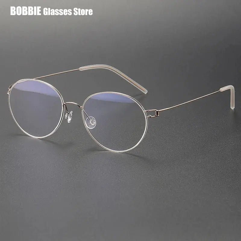 Bobbie 175343 Women’s Screwless Full Rim Oval Titanium Frames — view 1 | Bobbie at FuzWeb