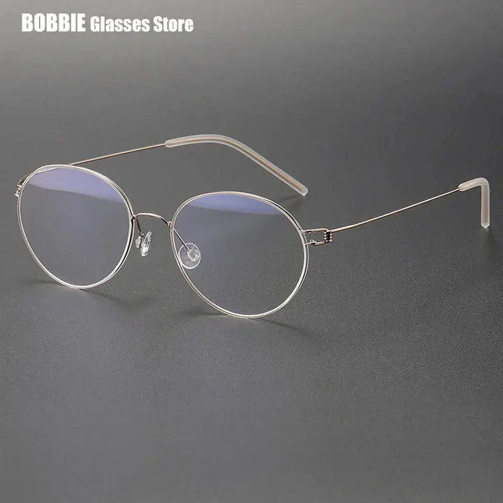 Bobbie 175343 Women’s Screwless Full Rim Oval Titanium Frames — view 1 | Bobbie at FuzWeb