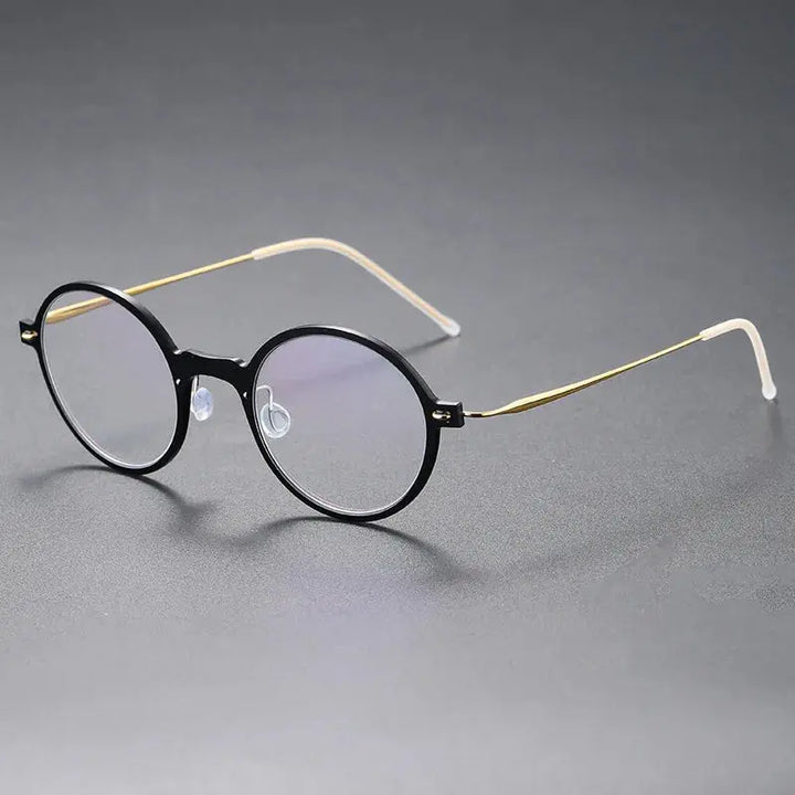Bobbie Unisex Full Rim Round Titanium Eyeglasses 650800 FuzWeb