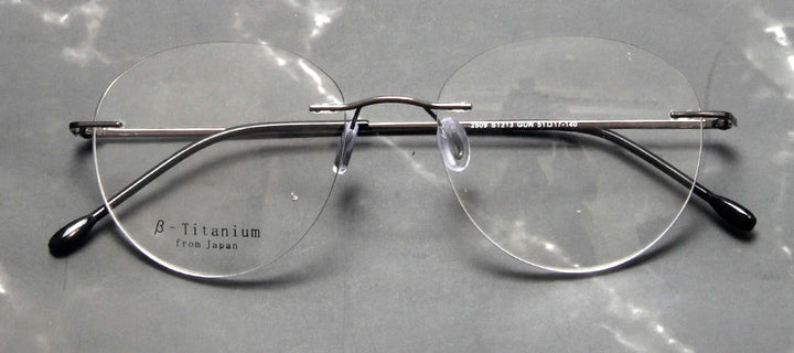 Esnbie Women's Rimless Small Oval Round Titanium Eyeglasses 243213