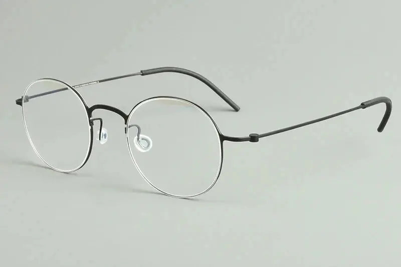Bobbie Full Rim 55O400 Unisex Screwless Titanium Round Frames — view 1 | Bobbie at FuzWeb