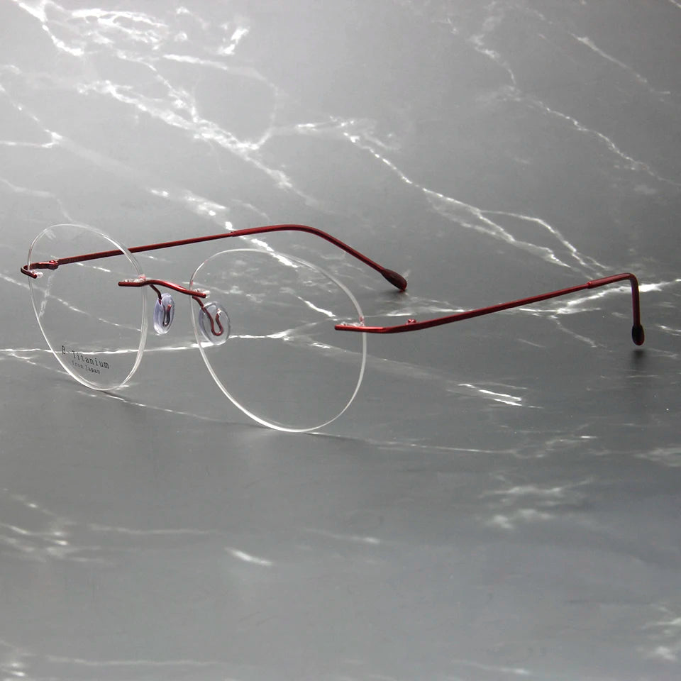 Esnbie Women's Rimless Small Oval Round Titanium Eyeglasses 243213