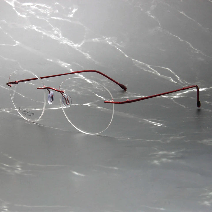 Esnbie Women's Rimless Small Oval Round Titanium Eyeglasses 243213