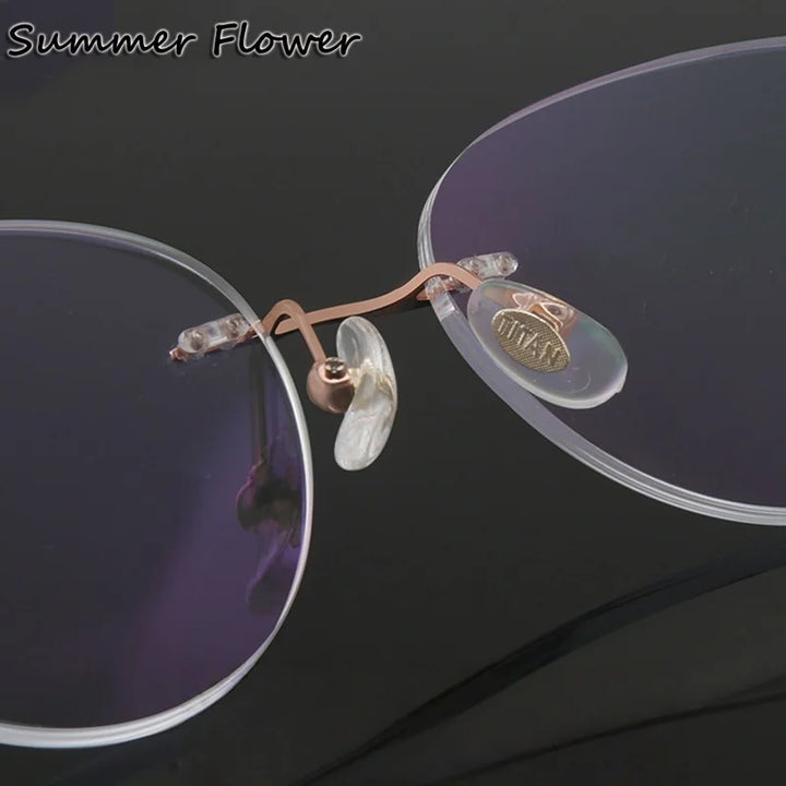 Summer Flower Women's Rimless Round Cat Eye Titanium Eyeglasses 694218