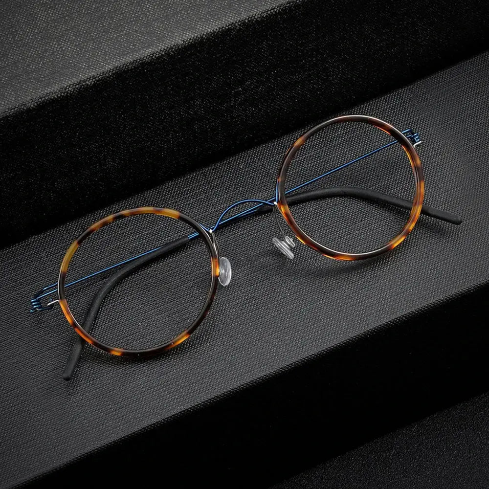 Bobbie 504522 Women’s Titanium Full-Rim Round Frames FuzWeb