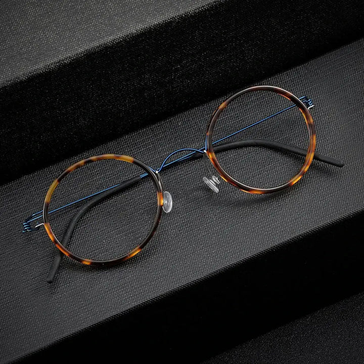Bobbie 504522 Women’s Titanium Full-Rim Round Frames FuzWeb