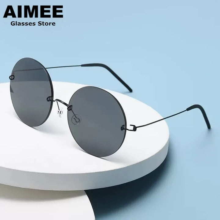 Aimee Unisex Rimless Round Titanium Screwless Sunglasses 762395