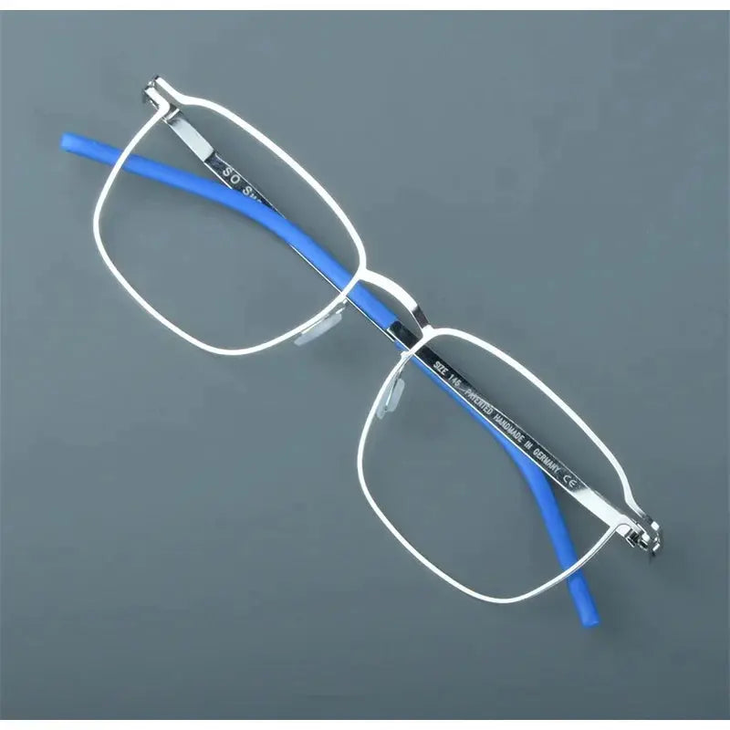 Bobbie 185342 Unisex Screwless Full Rim Square Stainless Steel Frames — view 1 | Bobbie at FuzWeb