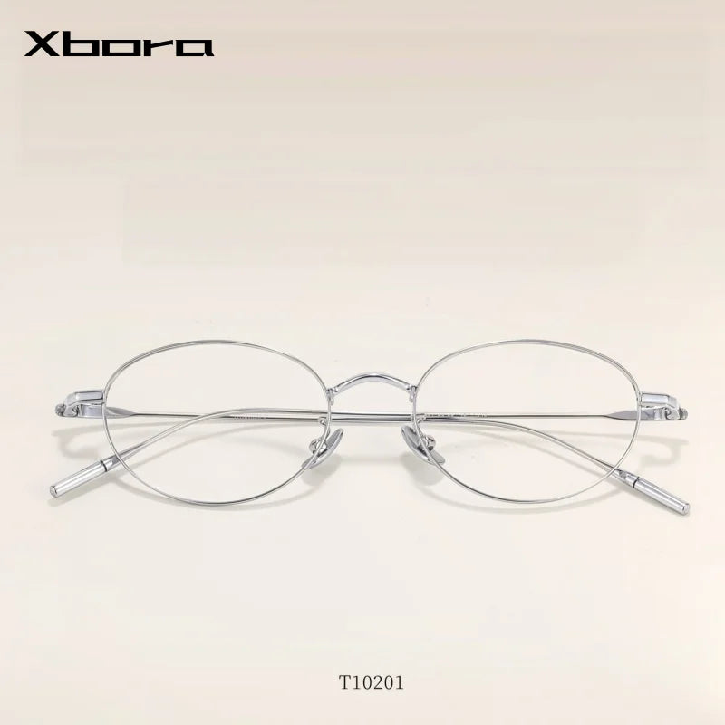 Xbora Unisex Full Rim Oval Pure Titanium Eyeglasses TI0201 — view 1 | Xbora at FuzWeb