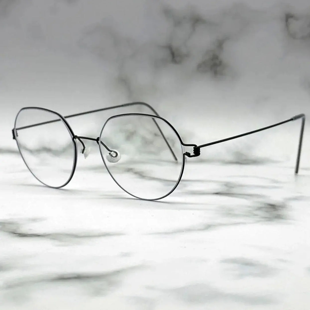 Bobbie 514717 Men’s Screwless Full Rim Flat Top Oval Titanium Frames — view 1 | Bobbie at FuzWeb