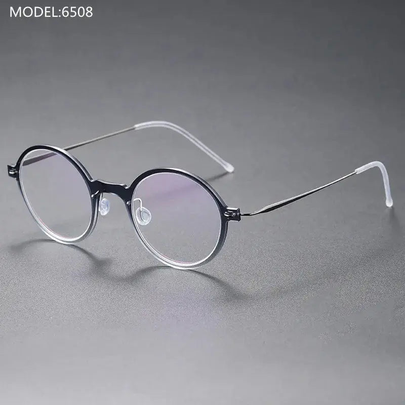 Bobbie Unisex Full Rim Round Titanium Eyeglasses 650800 FuzWeb