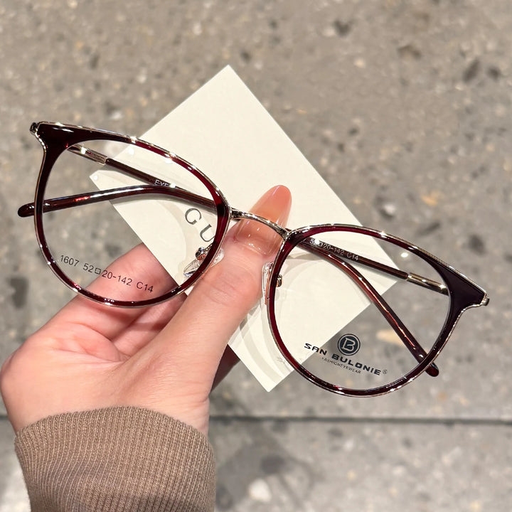 Yimaruili Women's Full Rim Round Cat Eye Tr 90 Alloy Eyeglasses 361607