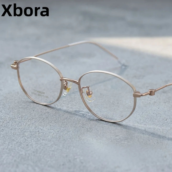 Xbora Unisex Full Rim Oval Pure Titanium Eyeglasses S7031 — view 1 | Xbora at FuzWeb