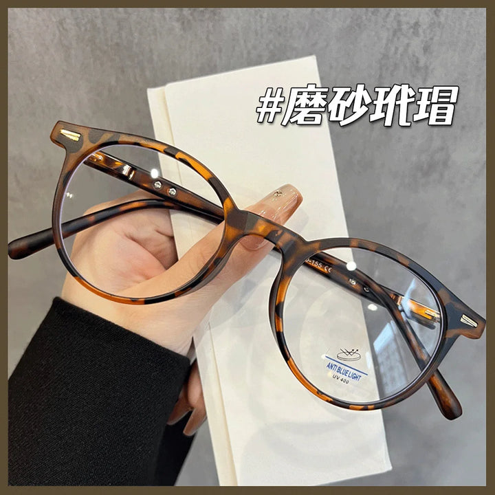 Zirosat Unisex Full Rim Round Tr 90 Alloy Eyeglasses 68008