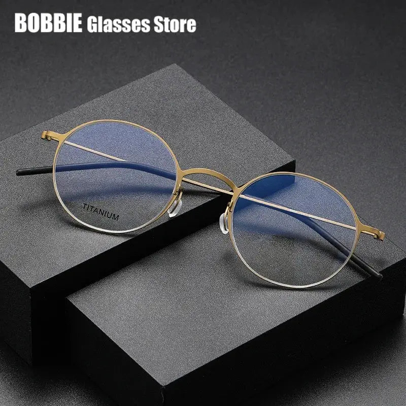 Bobbie 550400 Womens Full Rim Round Titanium Screwless Frames — view 1 | Bobbie at FuzWeb